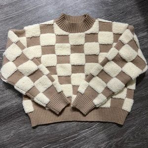 Cropped, checkered sweater. Size small medium and large